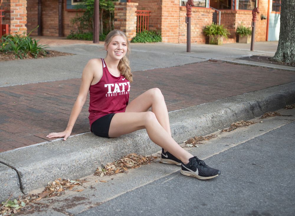 High school senior girl, Tate High track, senior portrait photography, downtown Pensacola, FL, pensacola senior portrait photographer