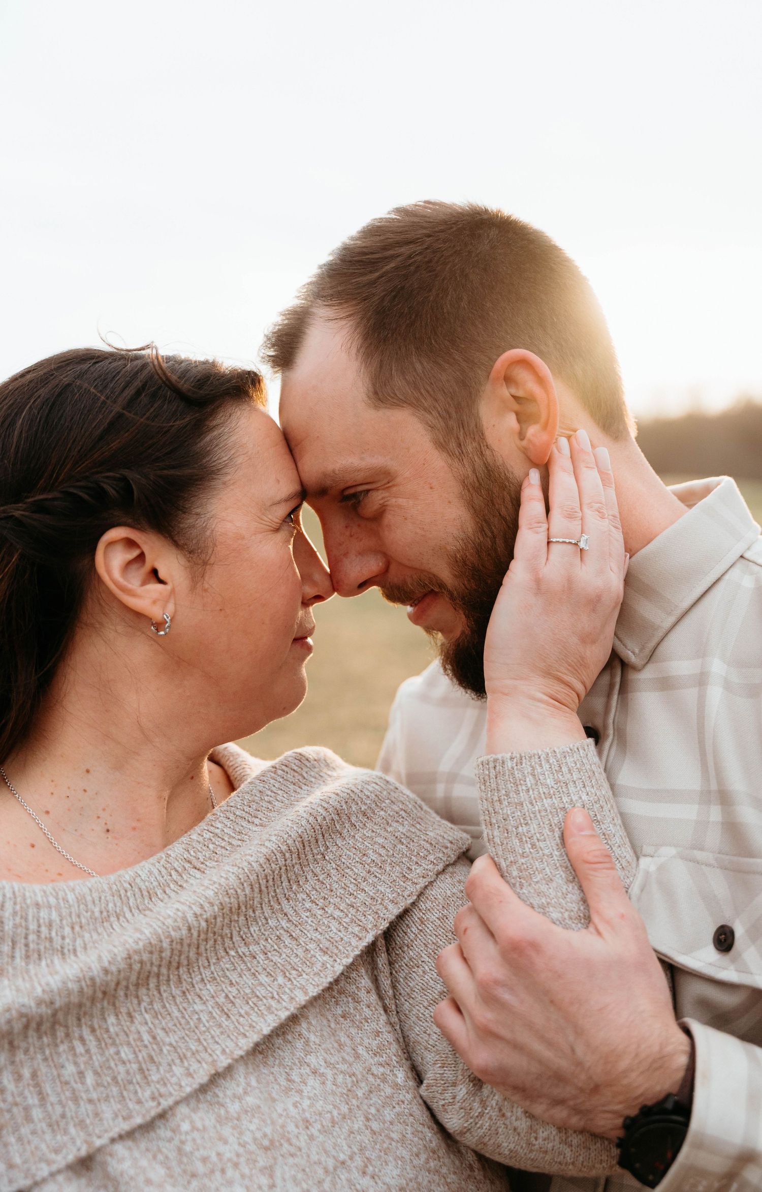 Intimate close-up portrait series showing tender moments between couple.