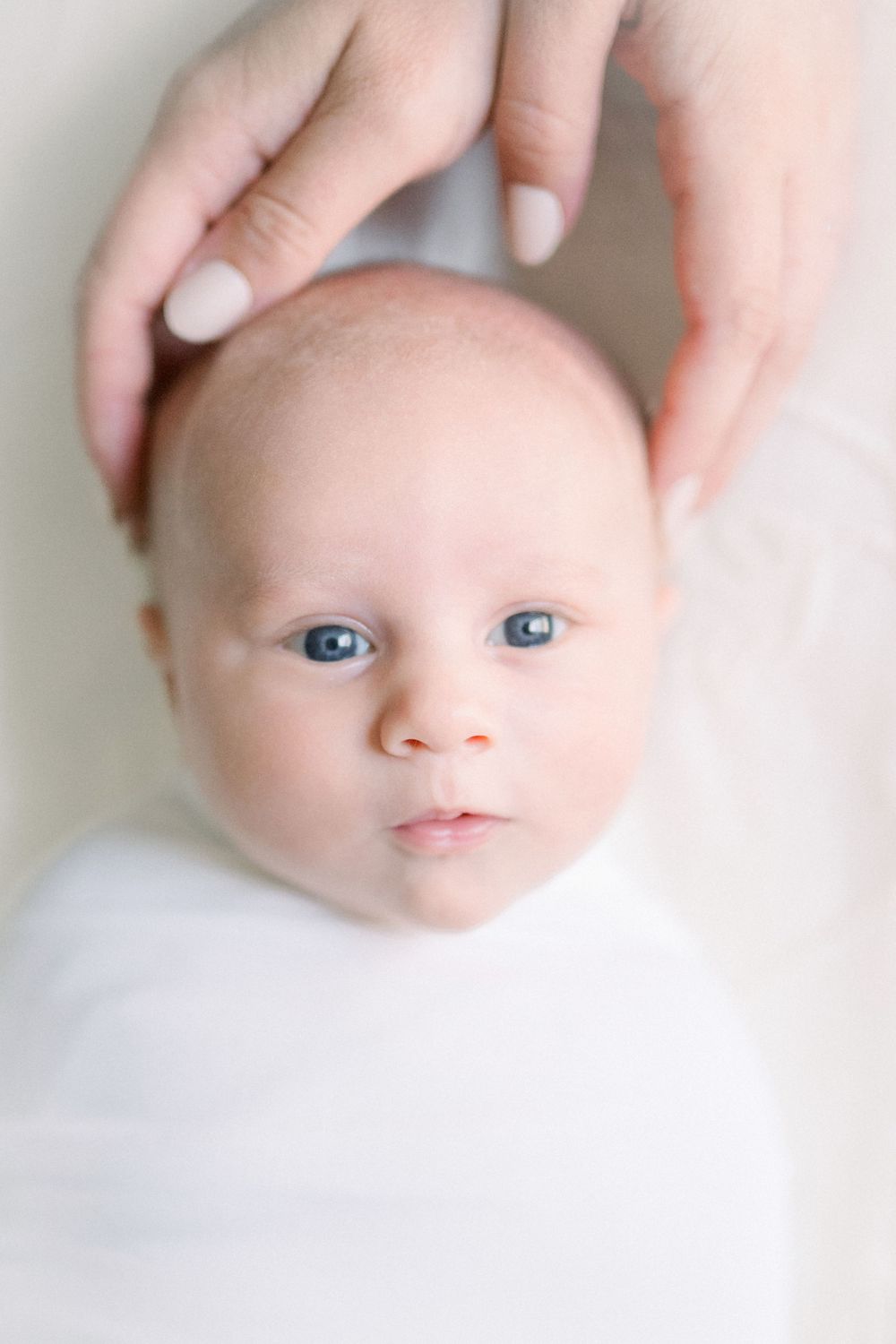 Close-up of newborn during an in-home newborn session in Del Ray Virginia