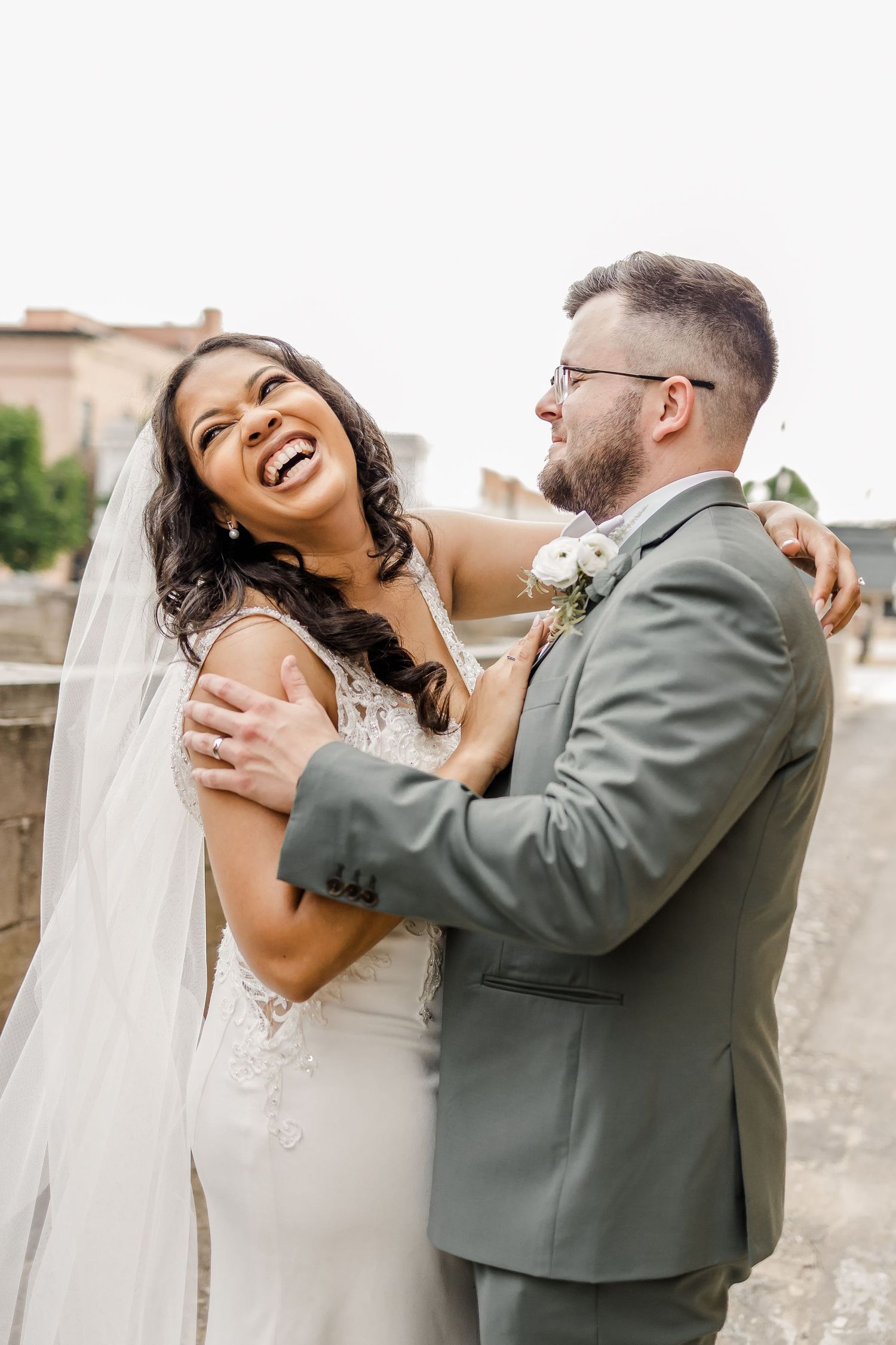 Joyful wedding couple laughing and embracing in candid sequence of photos.