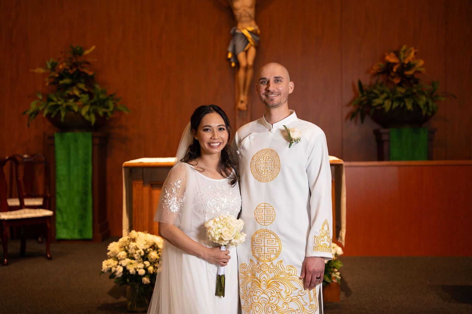 Veronica and Tim standing together at their wedding ceremony.