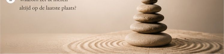 Balanced stack of smooth zen stones on raked sand, symbolizing mindfulness, harmony, and inner peace.