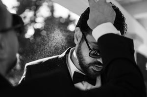 A series of black and white portraits showing dramatic lighting and shadows in an artistic style.