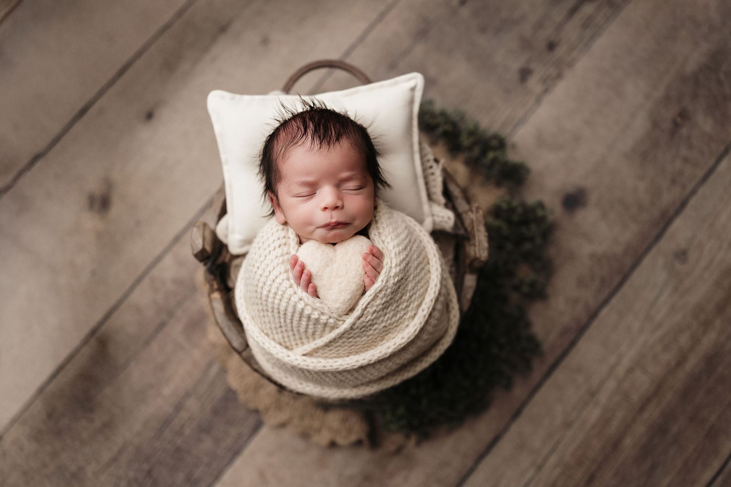 Classic posed newborn photography session in Magnolia Texas with wrapped and unwrapped baby portraits on soft neutral backdrops by Anna Carr