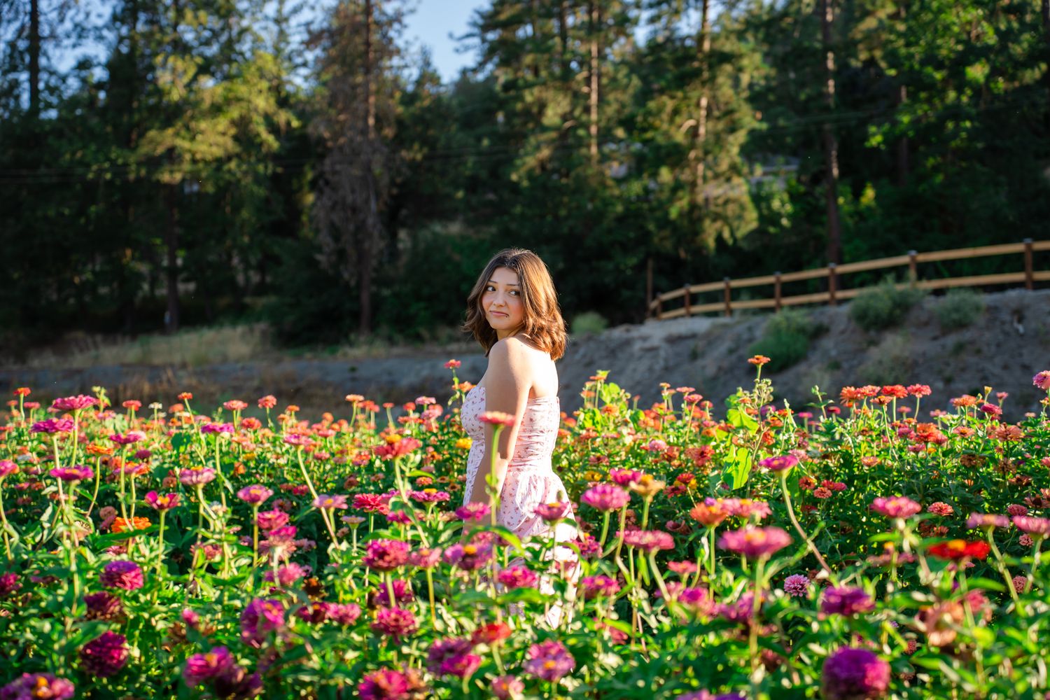 Senior portrait of a girl in a flower field