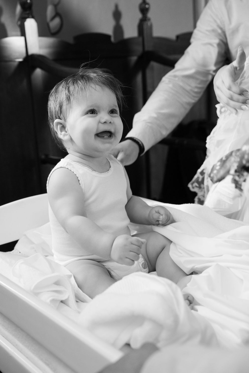 Candid family moments during a Macedonian Orthodox Christening in Wollongong