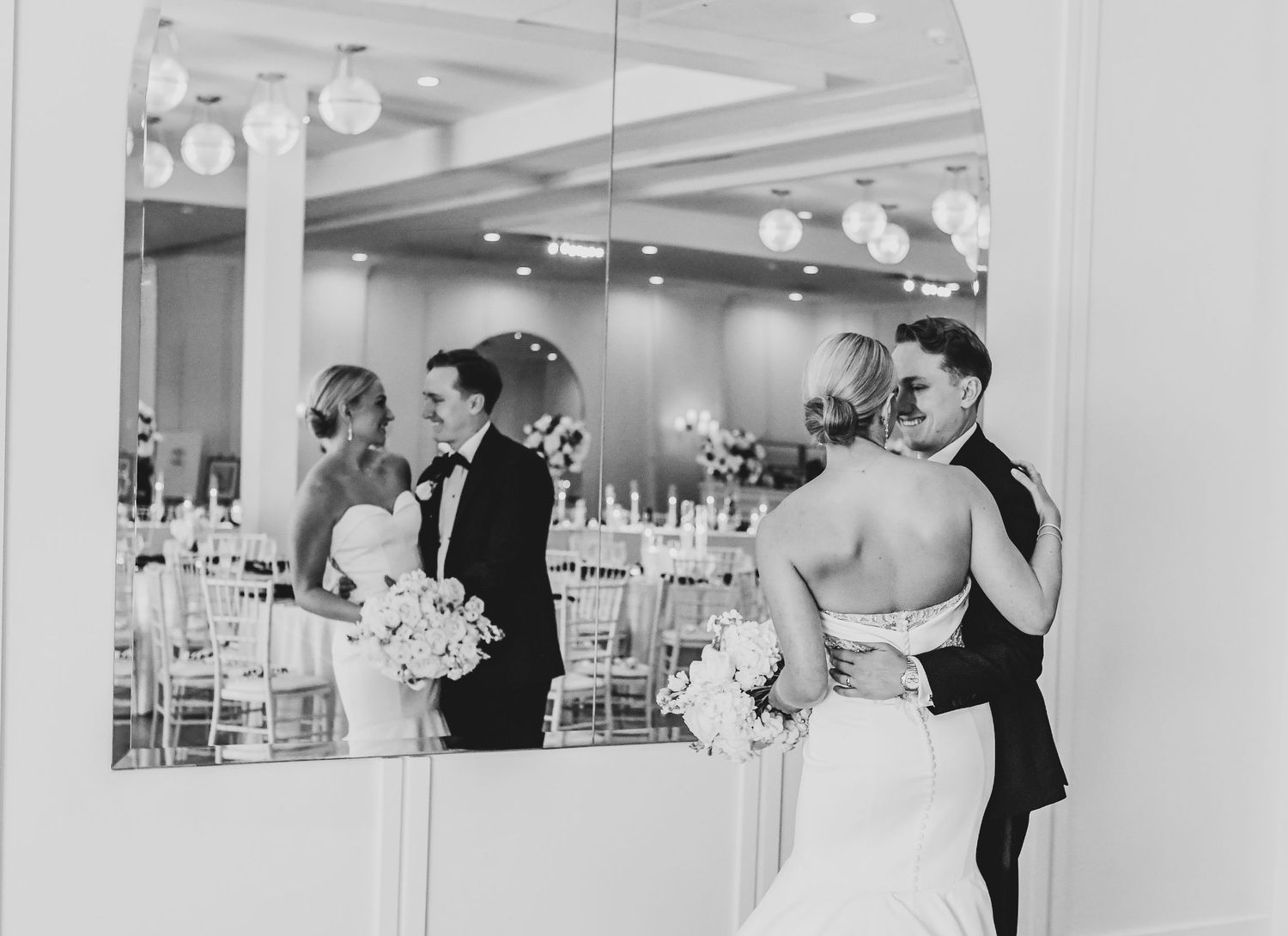 Bride and groom surrounded by candlelight at their Dallas reception
