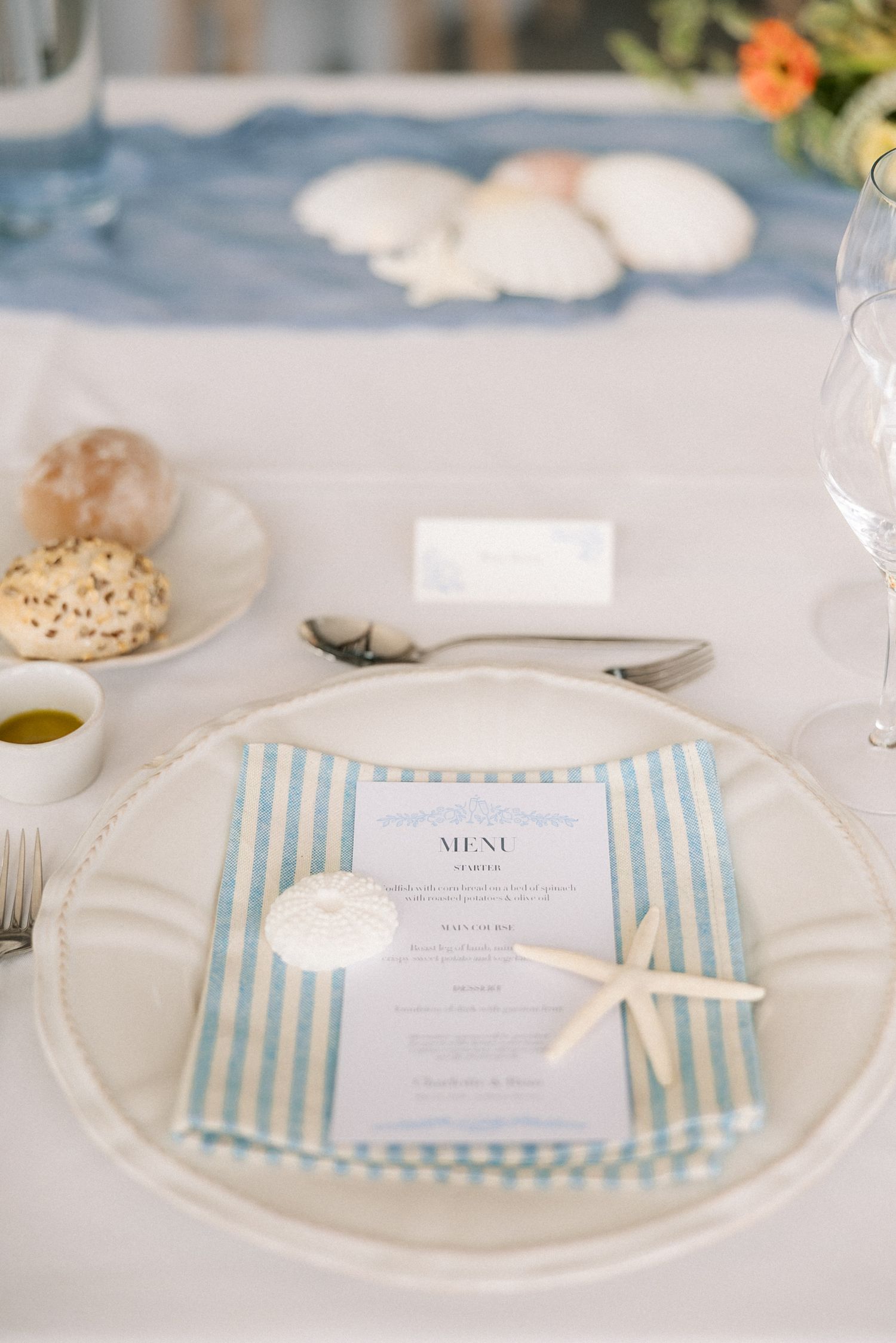 Champagne and coastal wedding reception details inspired by the Atlantic Ocean at Arriba by the Sea, Portugal.