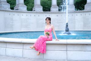 Prom portrait in a pink dress beside a fountain, Lake County IL prom photography