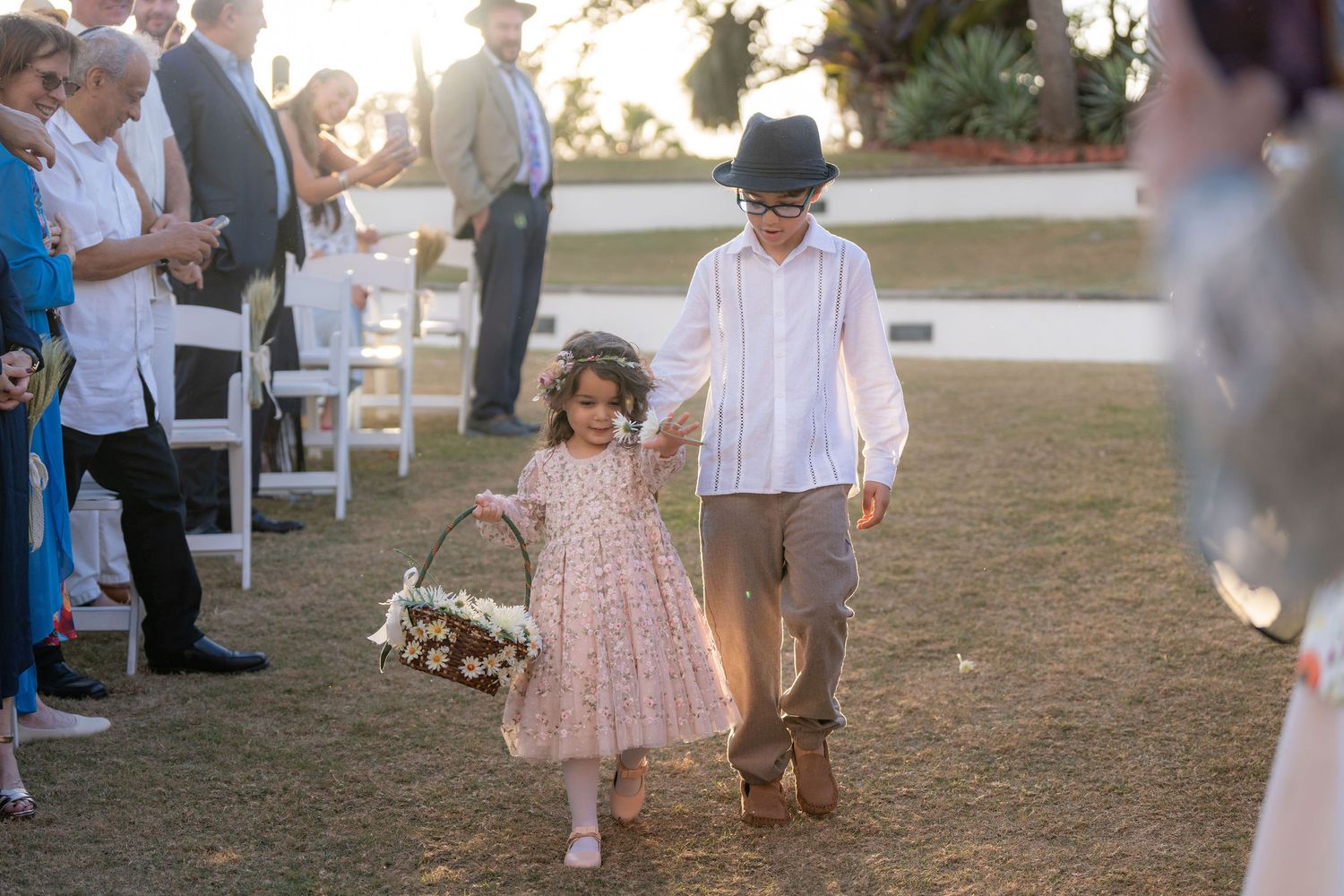 Flower girl and ring bearer walking the aisle at a Mansion at Tuckahoe wedding