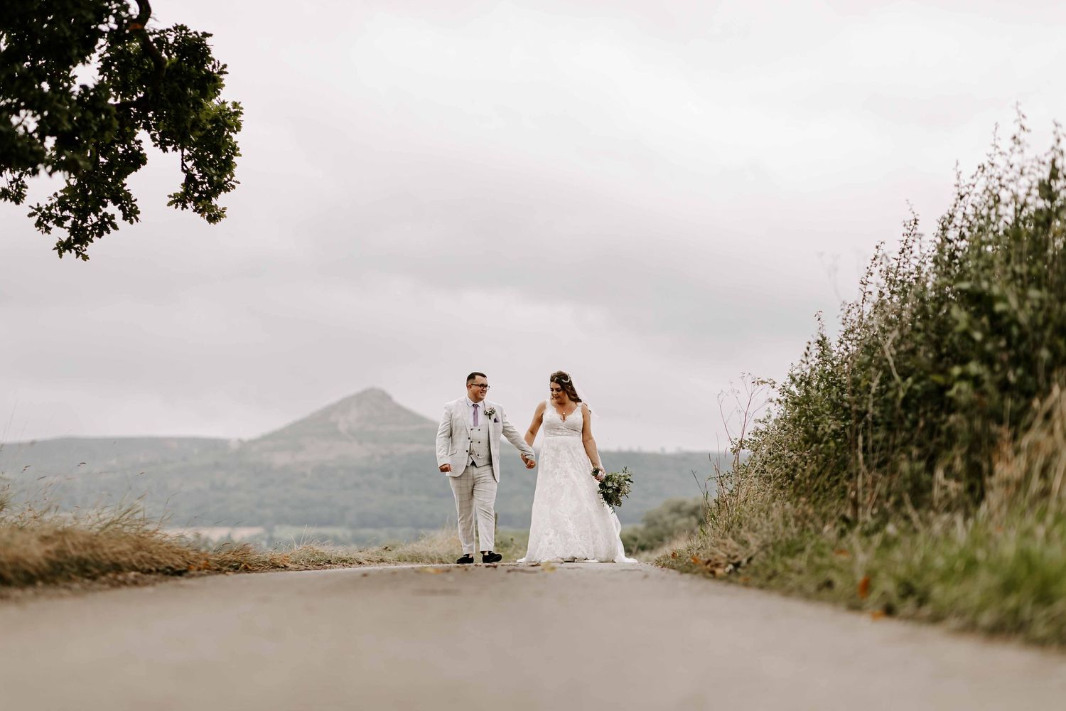 Wedding couple at the Treebridge Hotel, Middlesbrough, with Roseberry Topping behind