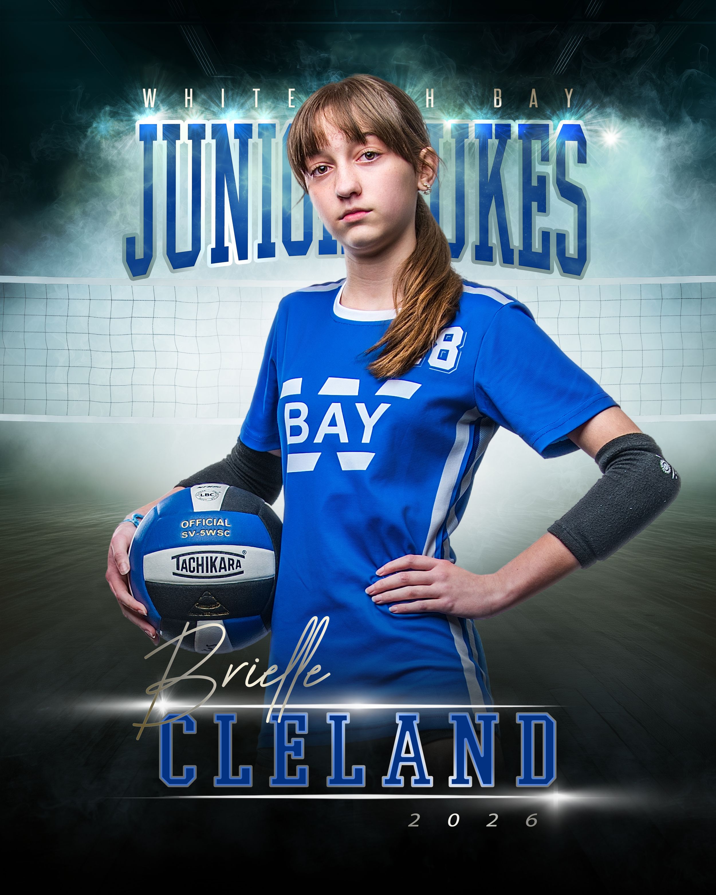 Brielle Cleland, White Bay Junior Dukes volleyball player #8, poses with a ball in a blue jersey, 2026.