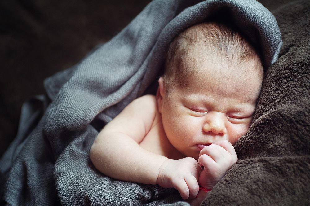 Fine art newborn portrait photographed by Houston newborn photographer