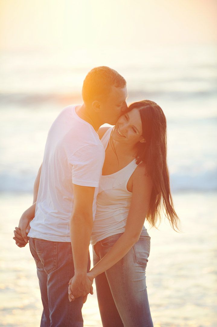 Engagement photography session at the beach captured by Houston couples photographer