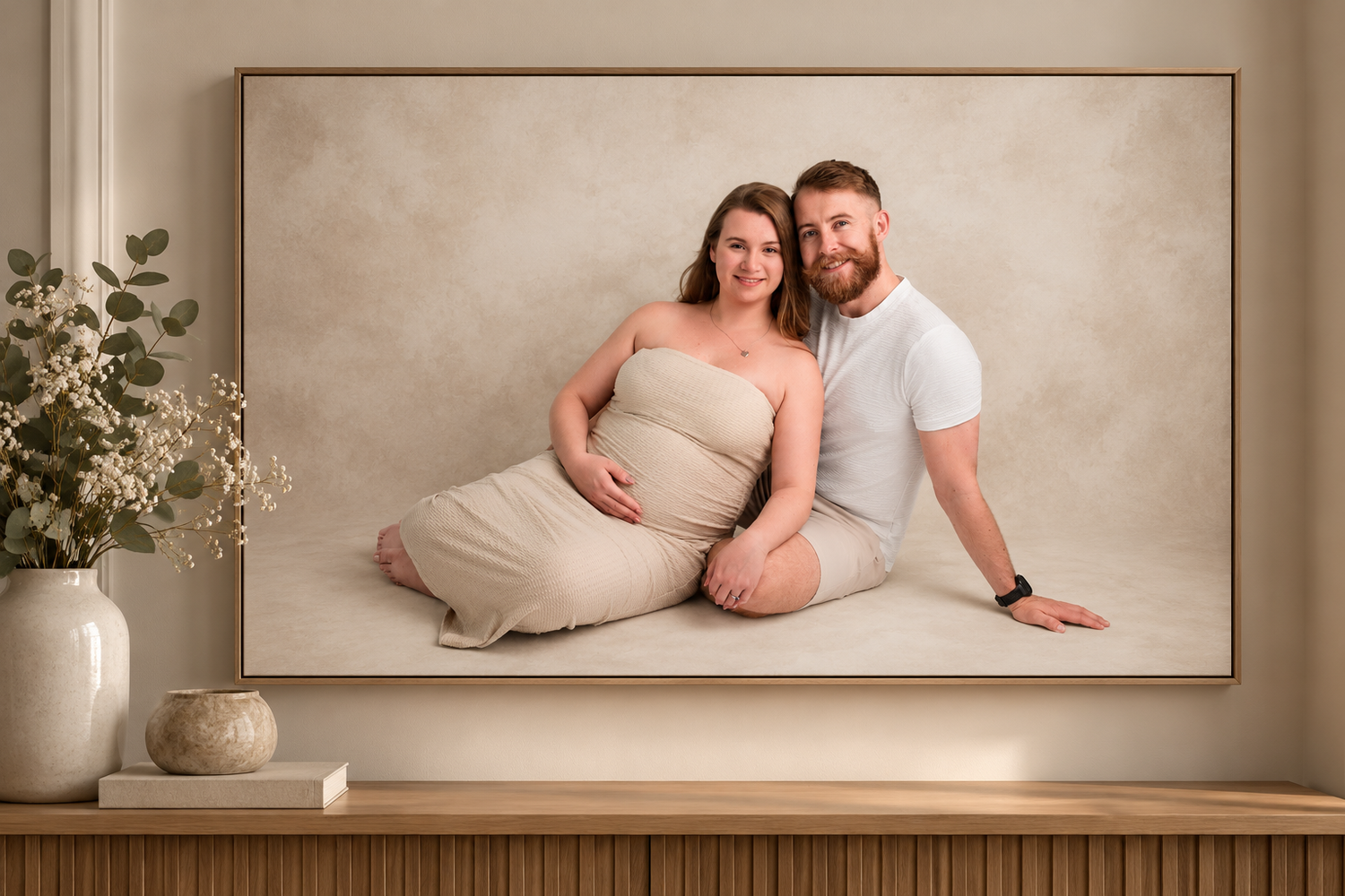 A series of artistic maternity photos showing a pregnant woman's silhouette against a dark background.