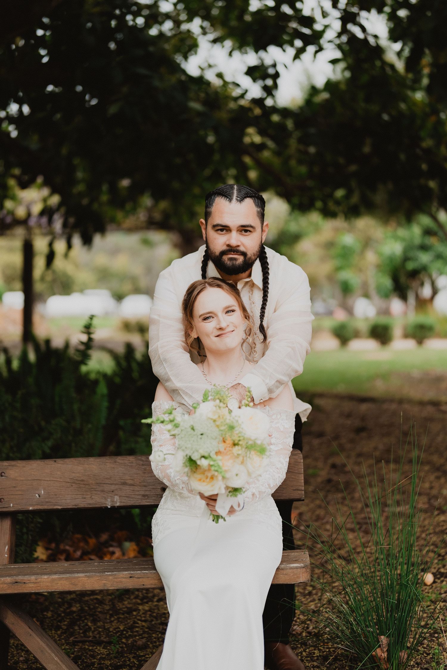 Christopher and Lucy embracing in the garden