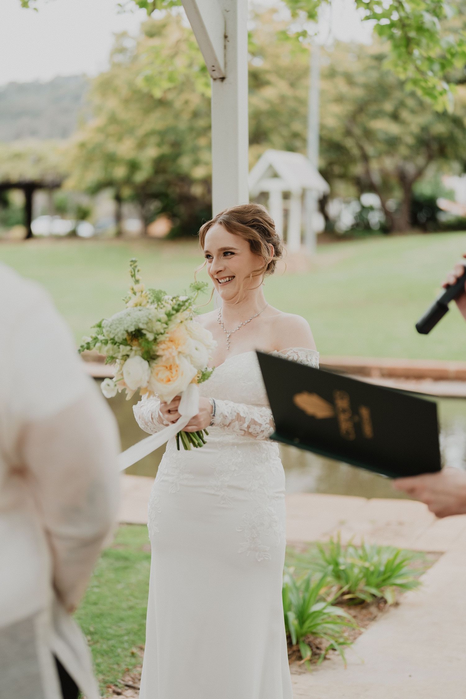 Signing the wedding register after the garden ceremony