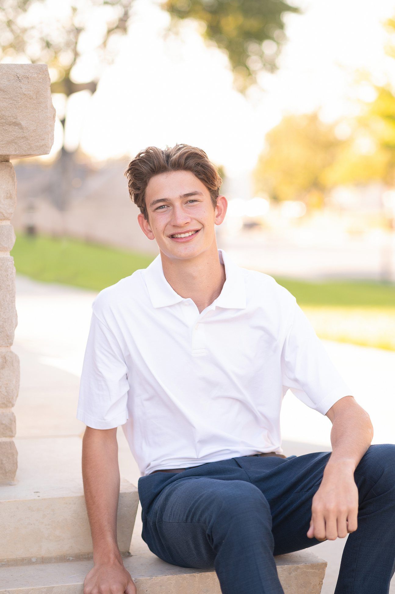 Bartlesville High Senior Guy Session in Downtown Bartlesville, BHS Track and Grassy Field by Bartlesville Senior Photogr