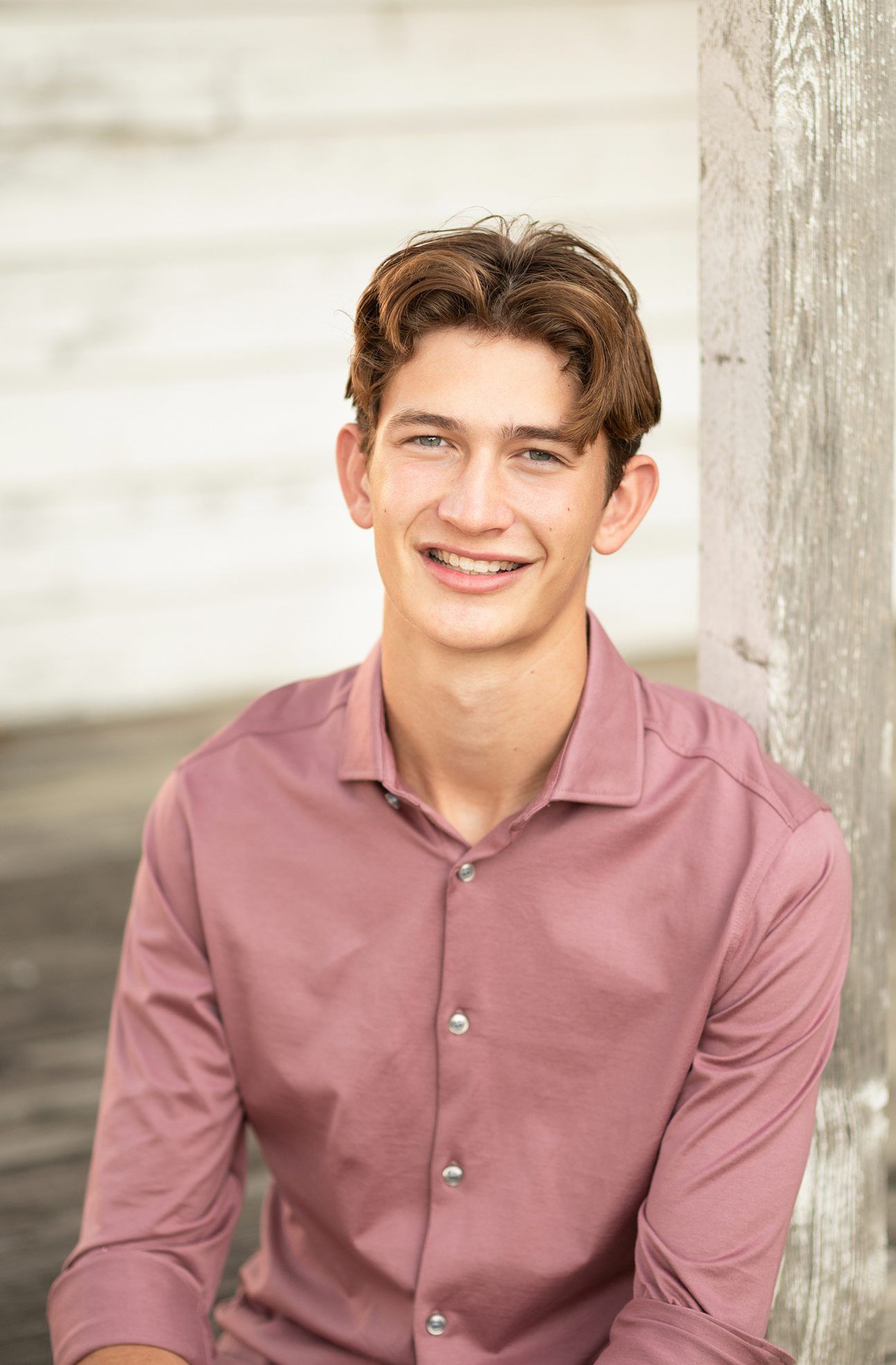 Bartlesville High Senior Guy Session in Downtown Bartlesville, BHS Track and Grassy Field by Bartlesville Senior Photogr