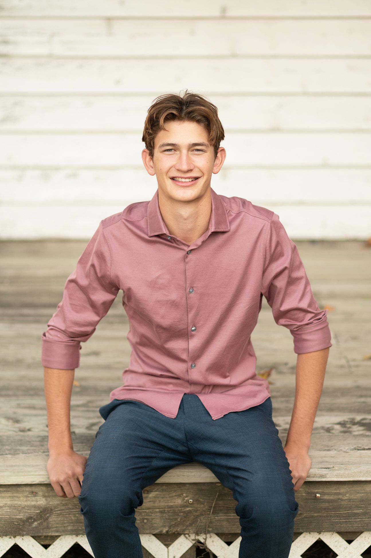 Bartlesville High Senior Guy Session in Downtown Bartlesville, BHS Track and Grassy Field by Bartlesville Senior Photogr