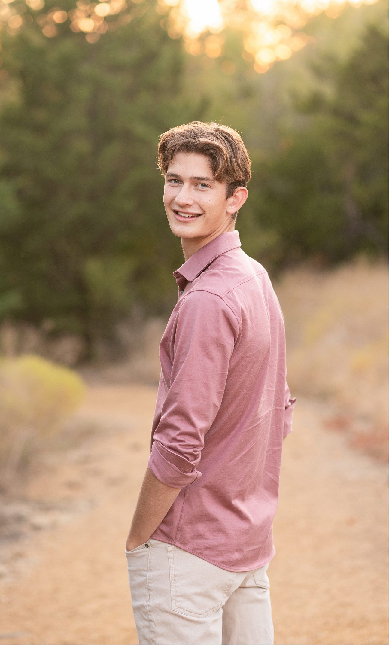 Bartlesville High Senior Guy Session in Downtown Bartlesville, BHS Track and Grassy Field by Bartlesville Senior Photogr