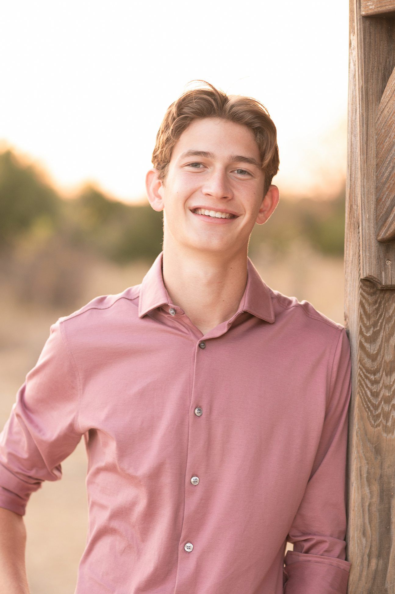 Bartlesville High Senior Guy Session in Downtown Bartlesville, BHS Track and Grassy Field by Bartlesville Senior Photogr