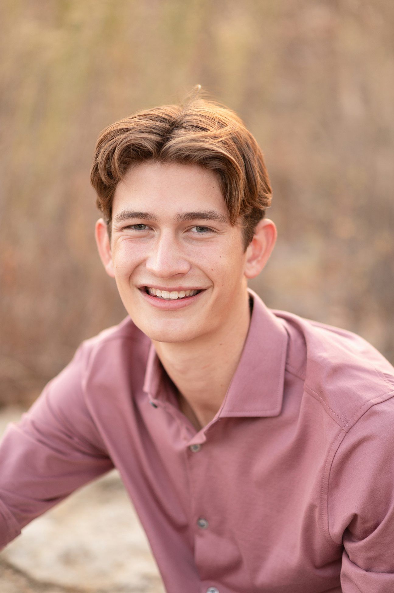 Bartlesville High Senior Guy Session in Downtown Bartlesville, BHS Track and Grassy Field by Bartlesville Senior Photogr