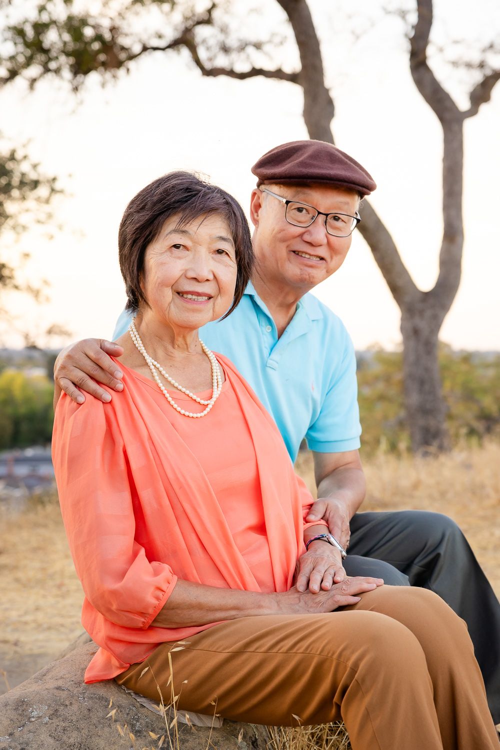 Grandparents smile during their San Jose golden hour photoshoot with Bay Area Photographer Cindy Tucey