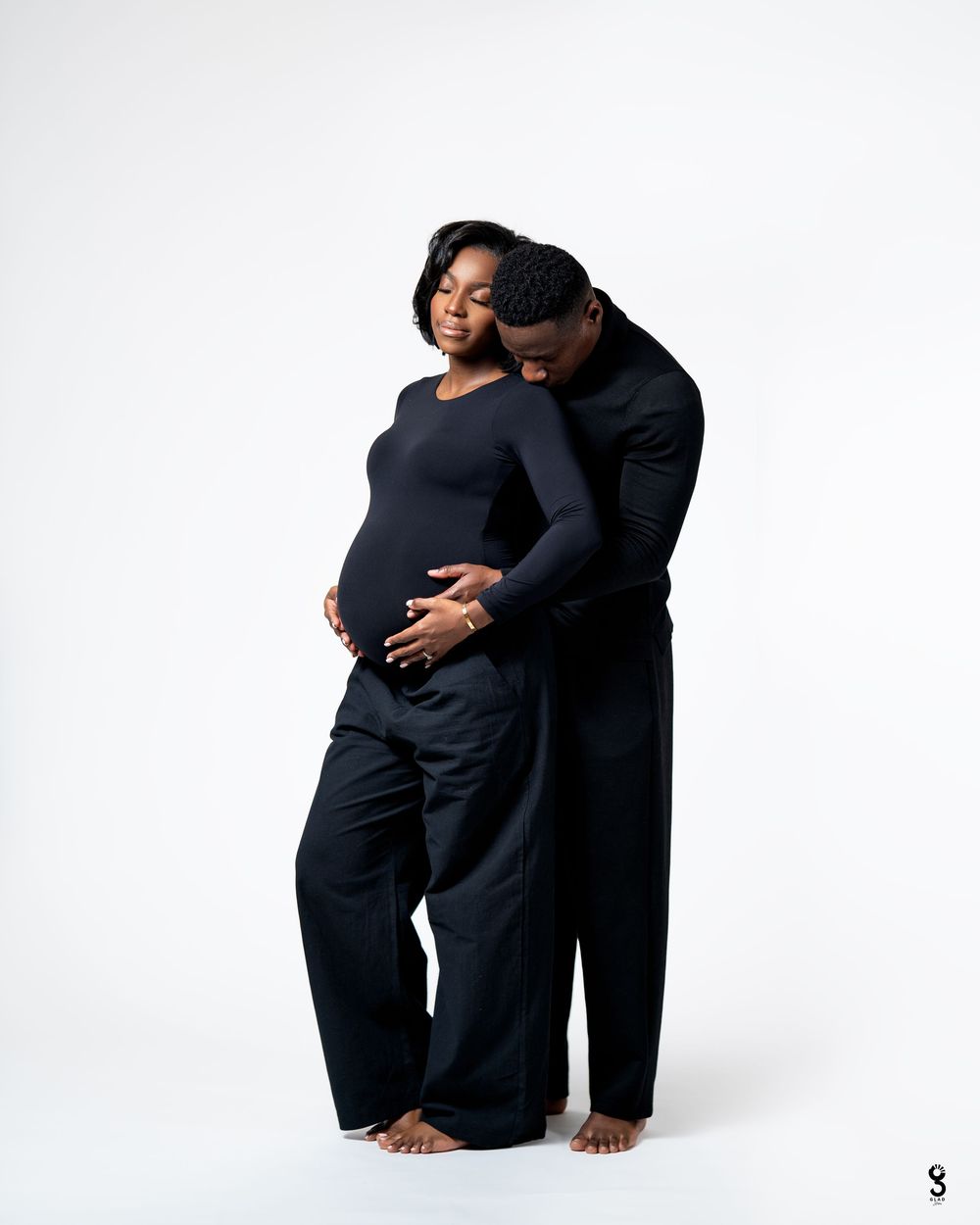 Intimate maternity photo series showing couple in black clothing against white background in three tender poses.