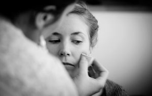 Black and white artistic close-up shots capturing intimate wedding day moments.