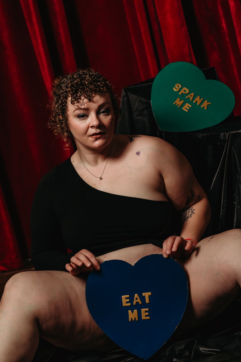 A series of four artistic boudoir photos with dark shadows and red curtain backdrop showing partial body silhouettes.