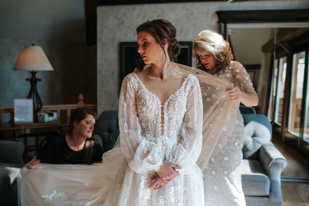 A collection of wedding photos showing a bride in a white lace dress from different angles and moments throughout the day.
