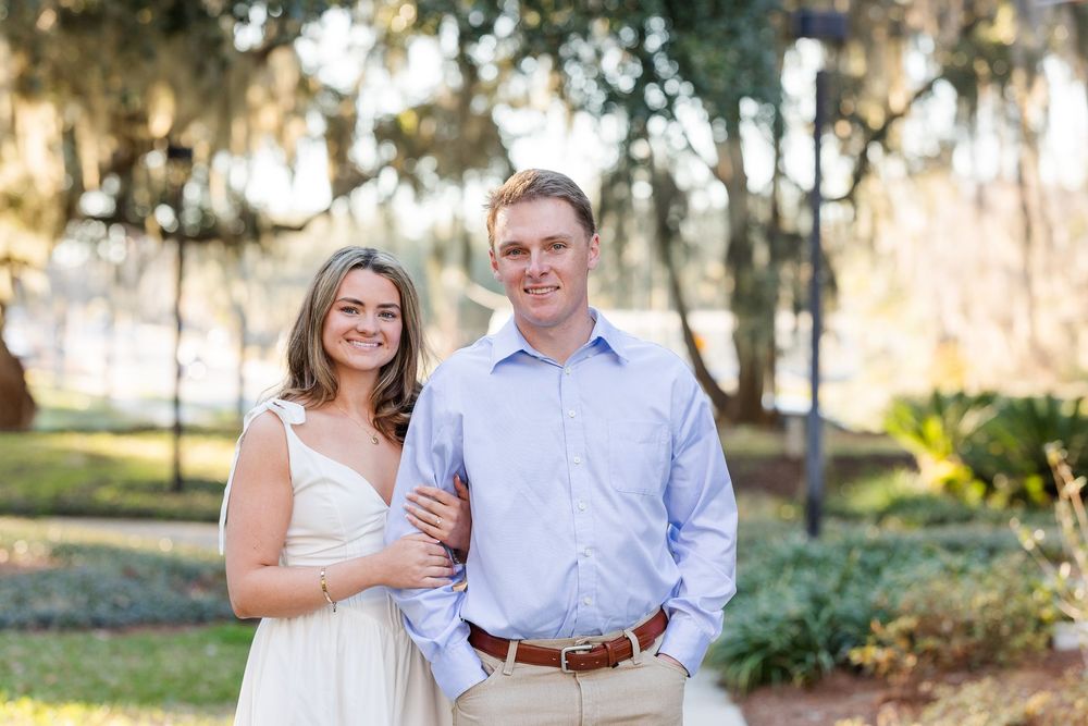 A couple poses together in an outdoor setting with trees and natural lighting in multiple candid shots.