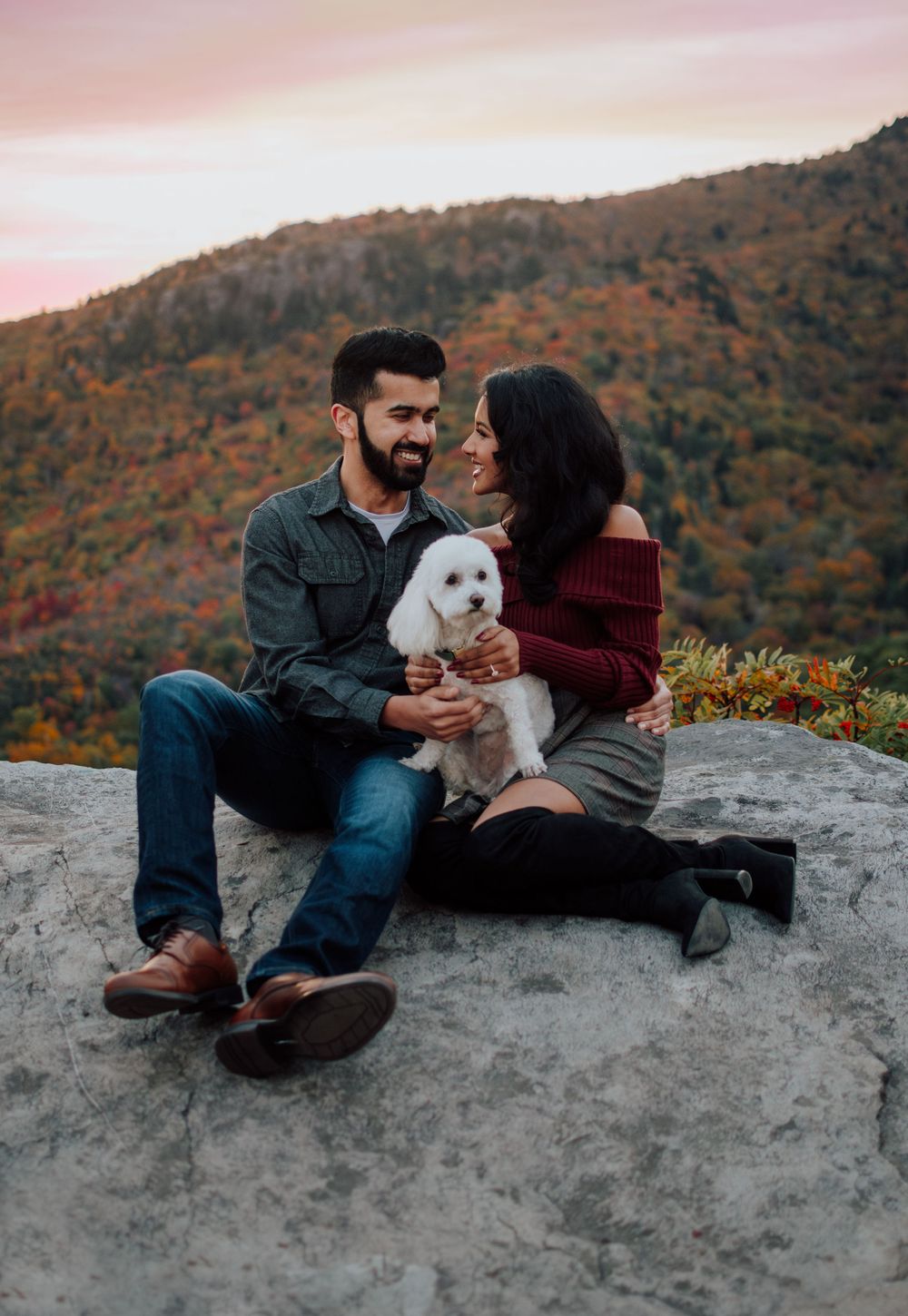 Romantic fall engagement photos of couple and puppy at Rough Ridge Overlook in Asheville, North Carolina.