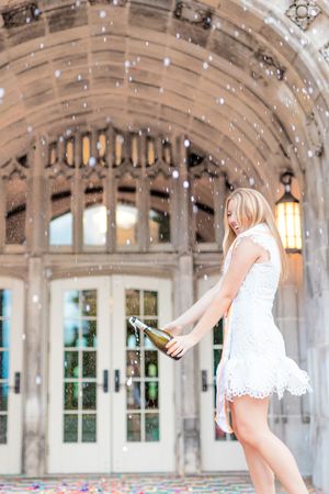 Elegant dance performance in a grand ballroom with arched ceilings and ornate architectural details.