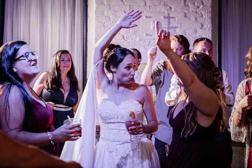 Bride dancing the night away during a wedding reception in Lindsay, Ontario.