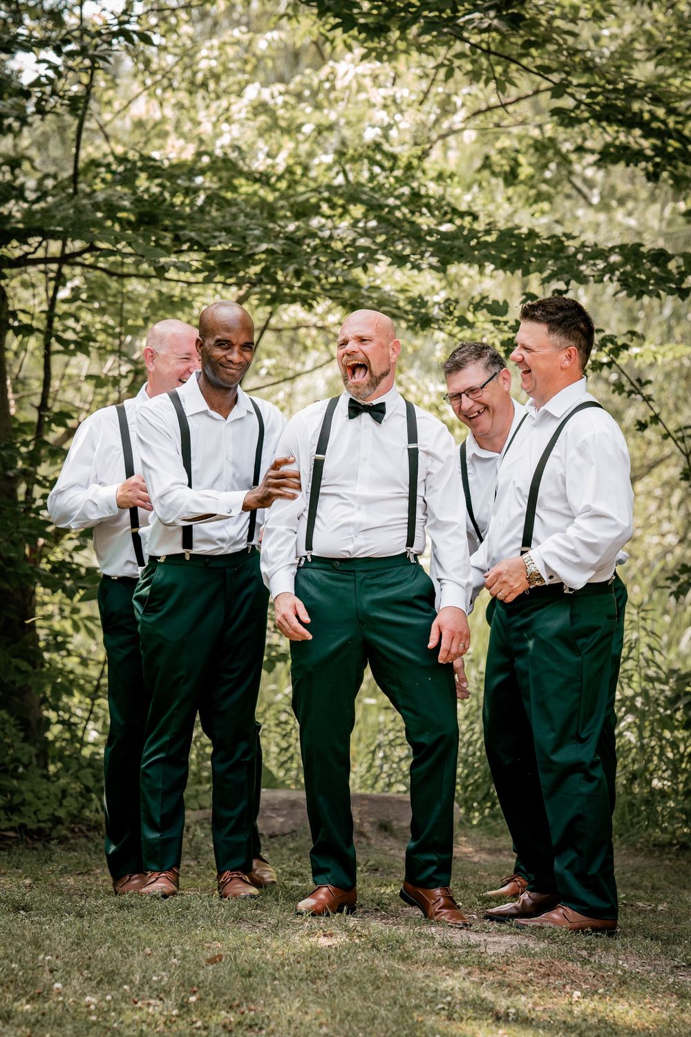 Wedding photography capturing a groom and his groomsmen at Terra Cotta Conservation Area, Ontario.