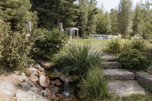Outdoor summer wedding venue surrounded by nature, Blueberry Hill Farms wedding venue photography packages with two photographers in NB