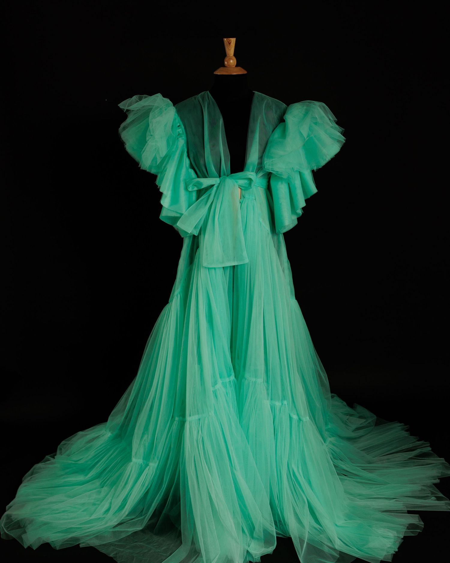 A flowing mint green chiffon nightgown with ruffled sleeves and sheer layers photographed from different angles.