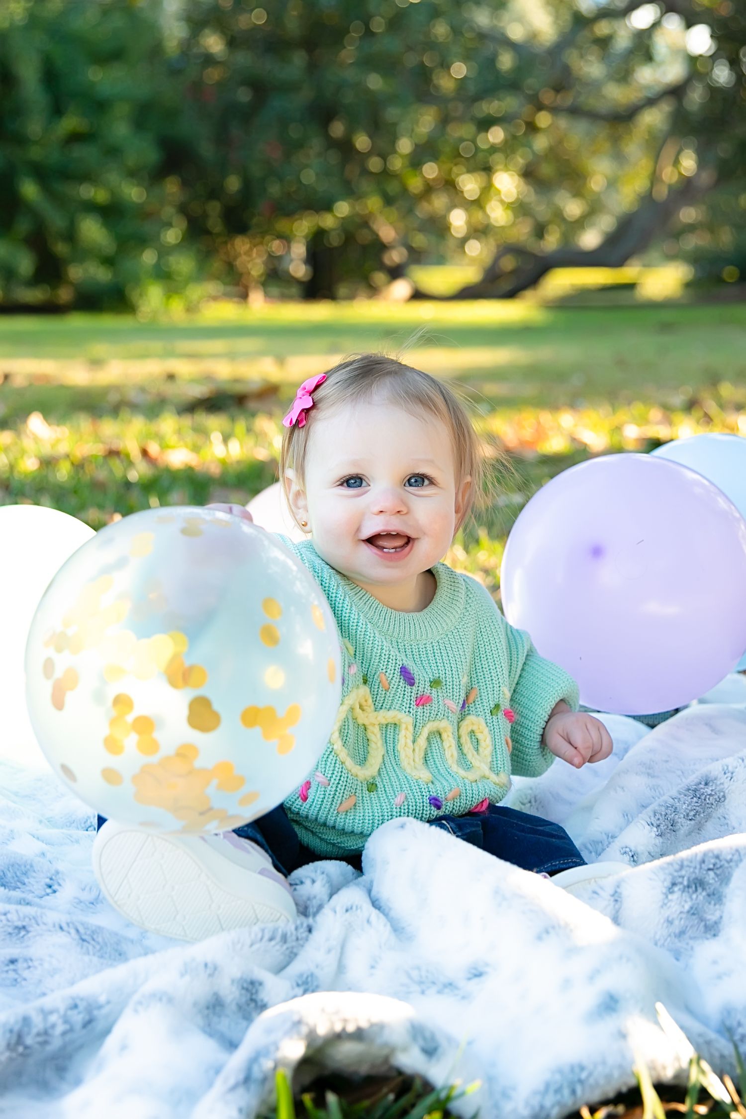 Baton Rouge photographer takes baby's first birthday pictures at the state capitol gardens in downtown Baton Rouge.