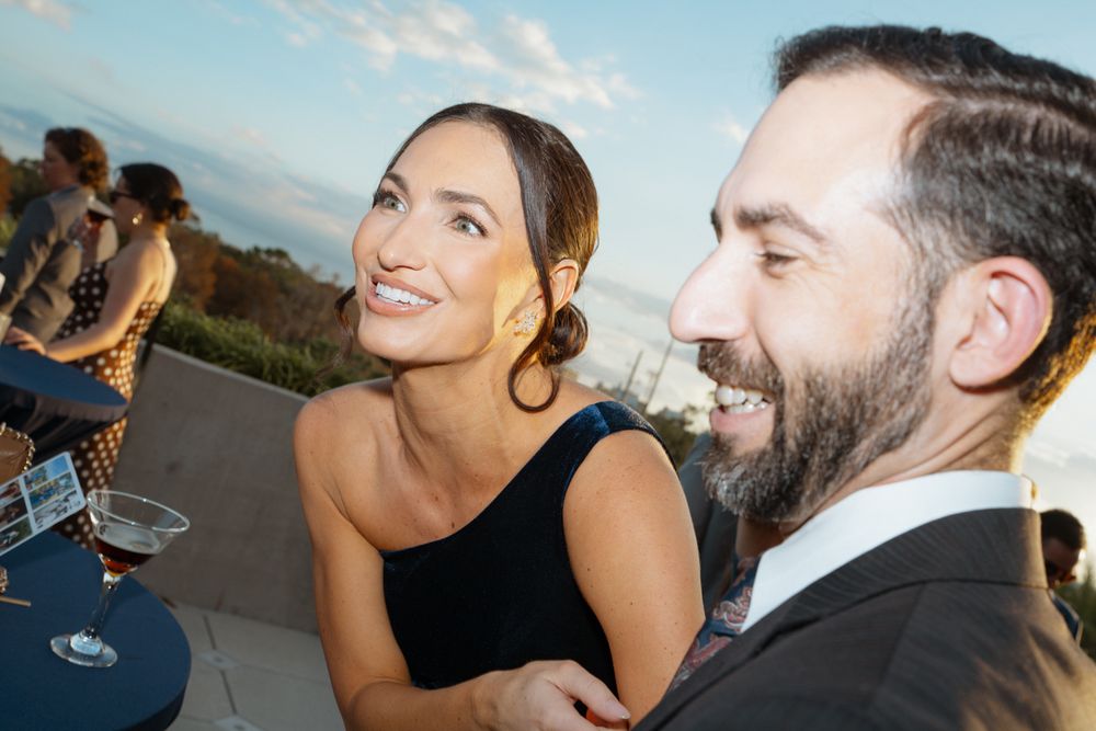 A series of candid moments showing a couple sharing drinks and laughing together outdoors.