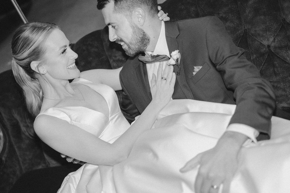 Black and white romantic wedding photos showing intimate moments between newlyweds in a candid photo collage.