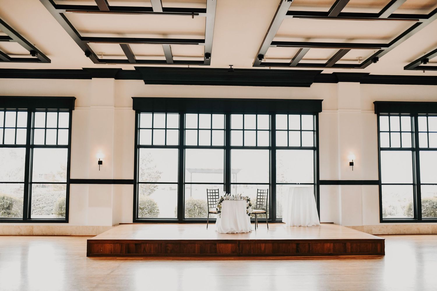 Luxurious indoor wedding reception setup at The Dalmore Event Venue with a clean modern aesthetic