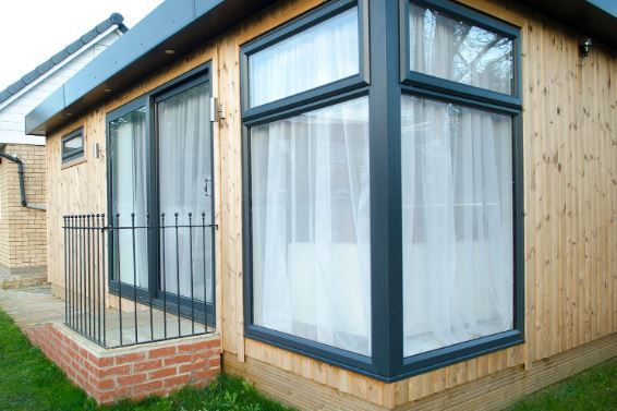 Photo of photography studio Emma Dicken in Great Heck. Wooden cabin in the garden