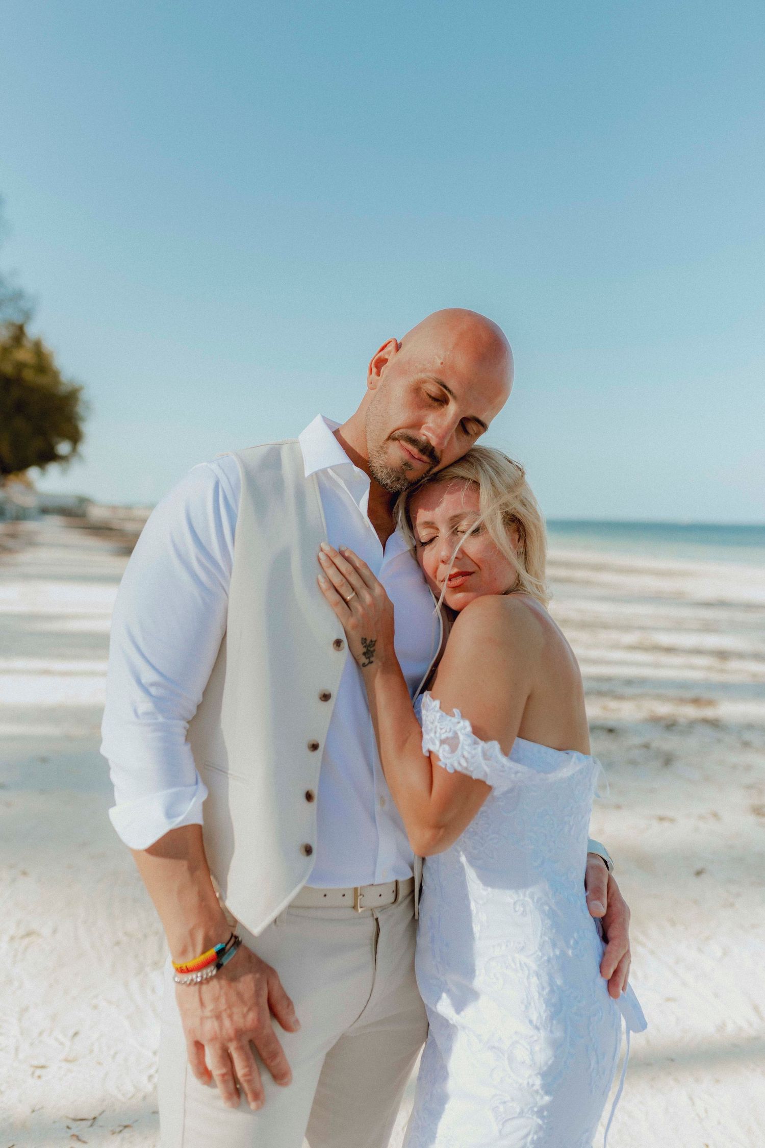 High-end wedding photographer in Zanzibar photographing an intimate moment