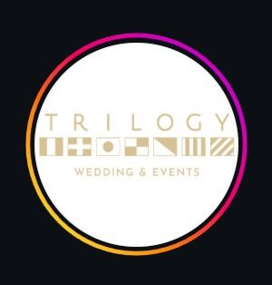 Wedding reception details with chalkboard signs and flowing white dress on Maui, Hawaii.