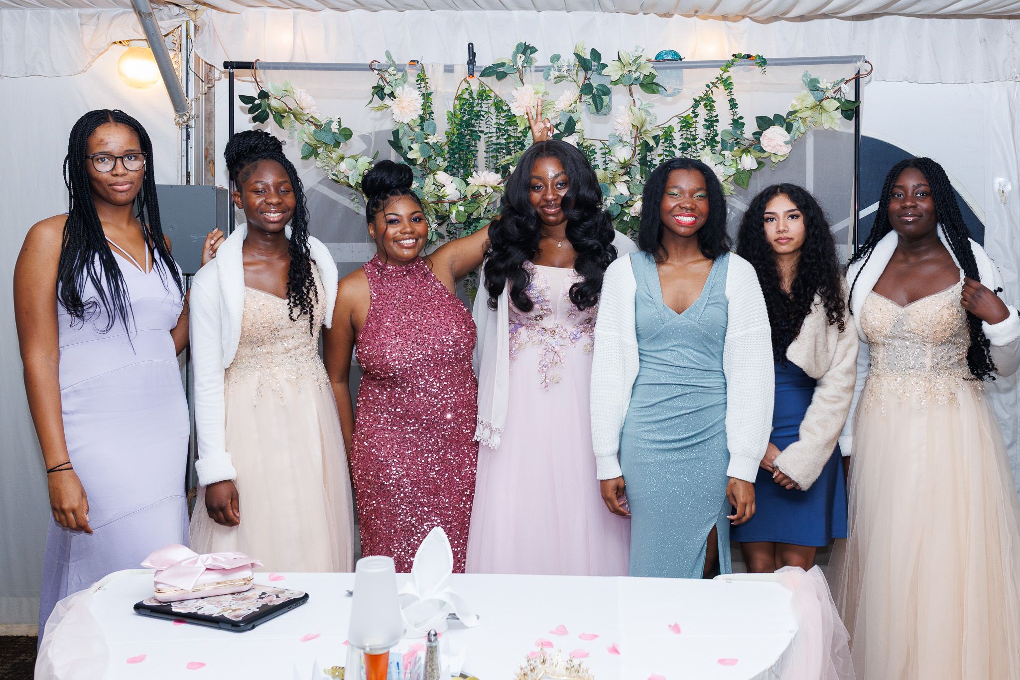 A collage of wedding party photos showing bridesmaids in various dresses posing together at different celebrations.