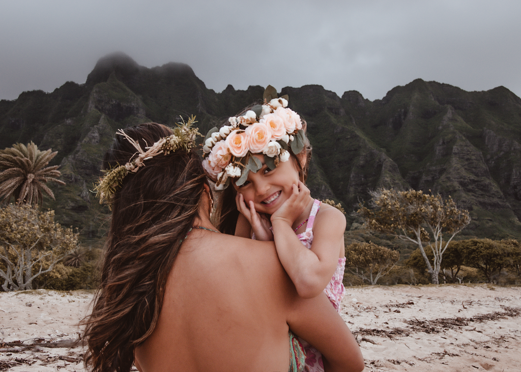 portrait session on the beach, cloudy, mountains on the beach