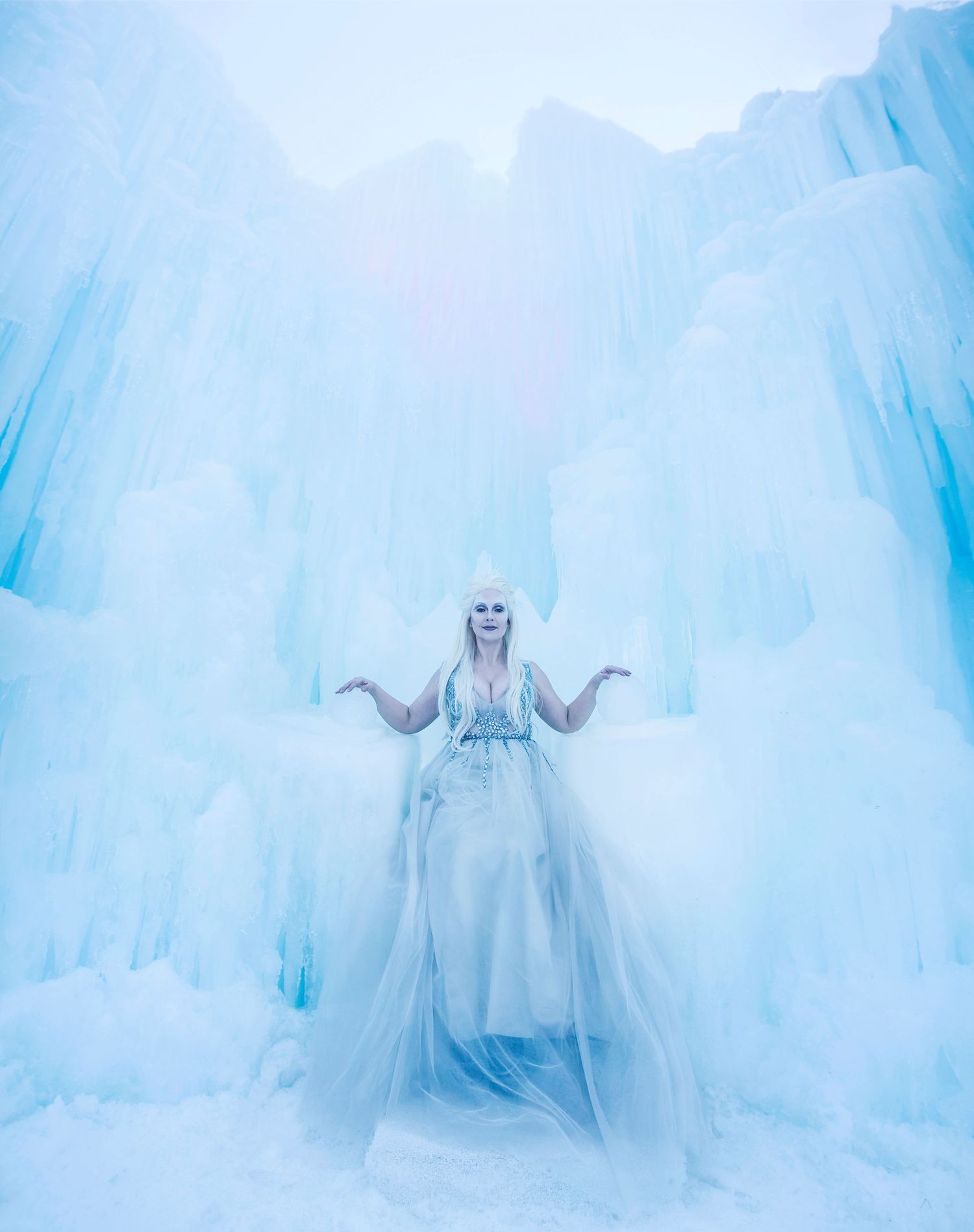 Snow queen on throne in Ice Castles Midway Utah