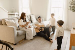 Bright and airy indoor lifestyle moments captured in a minimalist white room.